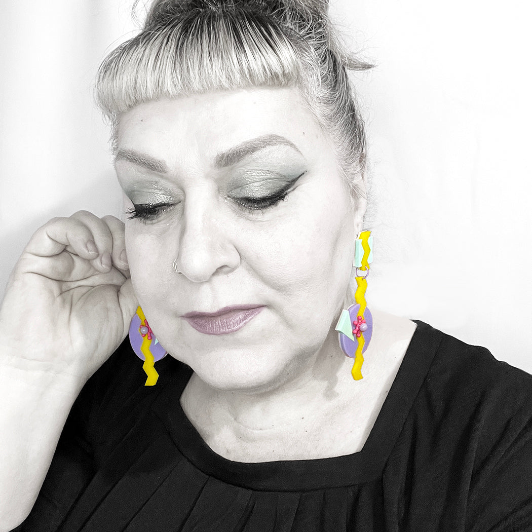 Woman wearing large Playhouse Earrings 