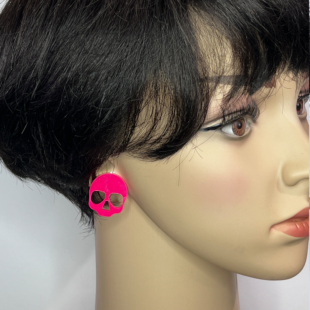 Hot Pink acrylic skull post earrings from by Barbe Jewelry. 