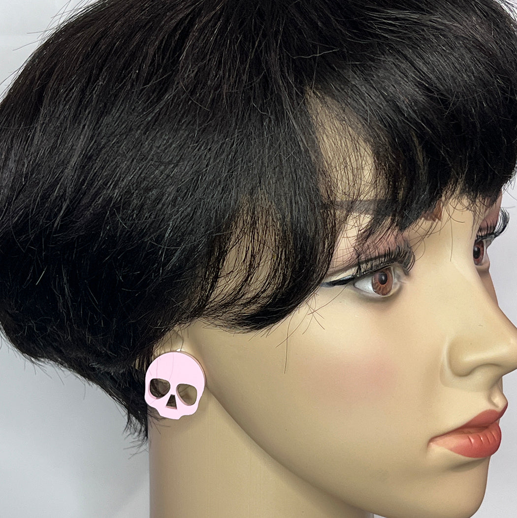 Pale Pink acrylic skull post earrings from by Barbe Jewelry. 