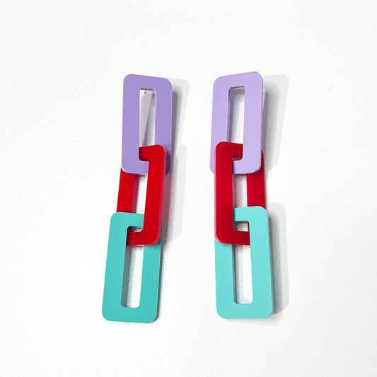 Fashion forward large and colorful link earrings in lavender, red and aqua from by Barbe Jewelry.
