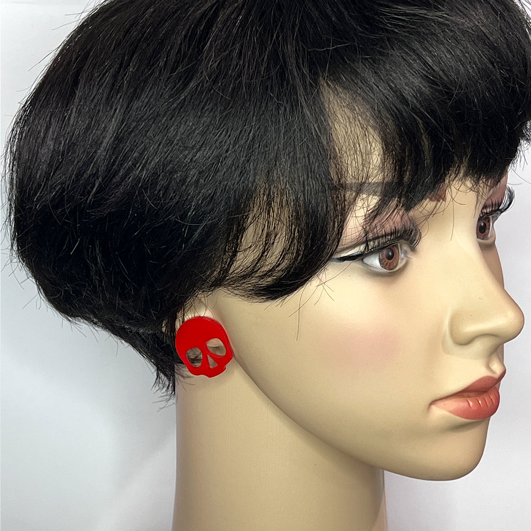 Red acrylic skull post earrings from by Barbe Jewelry. 