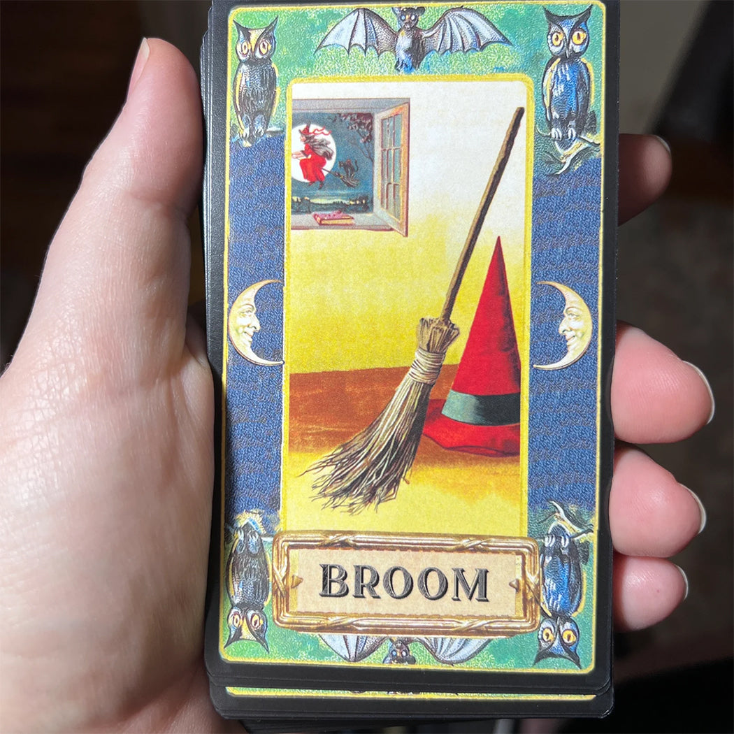 Broom card from the Tricks & Treats vintage Halloween Oracle deck by Barbe Saint John.