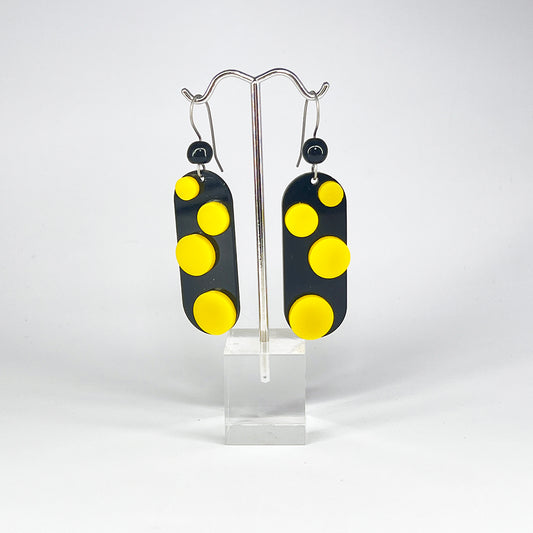 Infinite Dot Love Earrings in black and yellow from by Barbe Jewelry