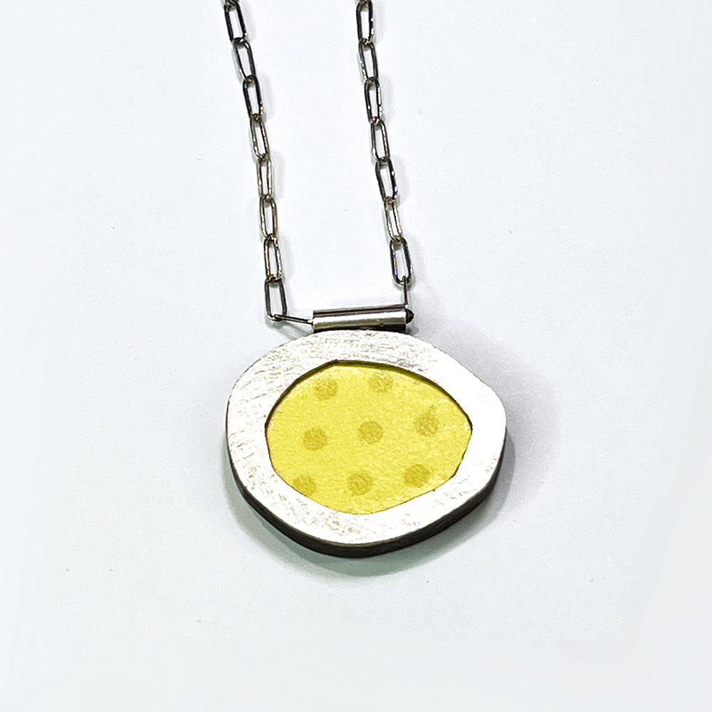 Abstract Oval with Yellow Dots
